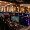 Modern university esports gaming lounge with rows of high-end gaming PCs